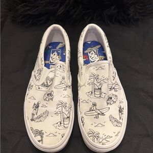 Vans low tide White Slip-Ons with Black Graphic Design